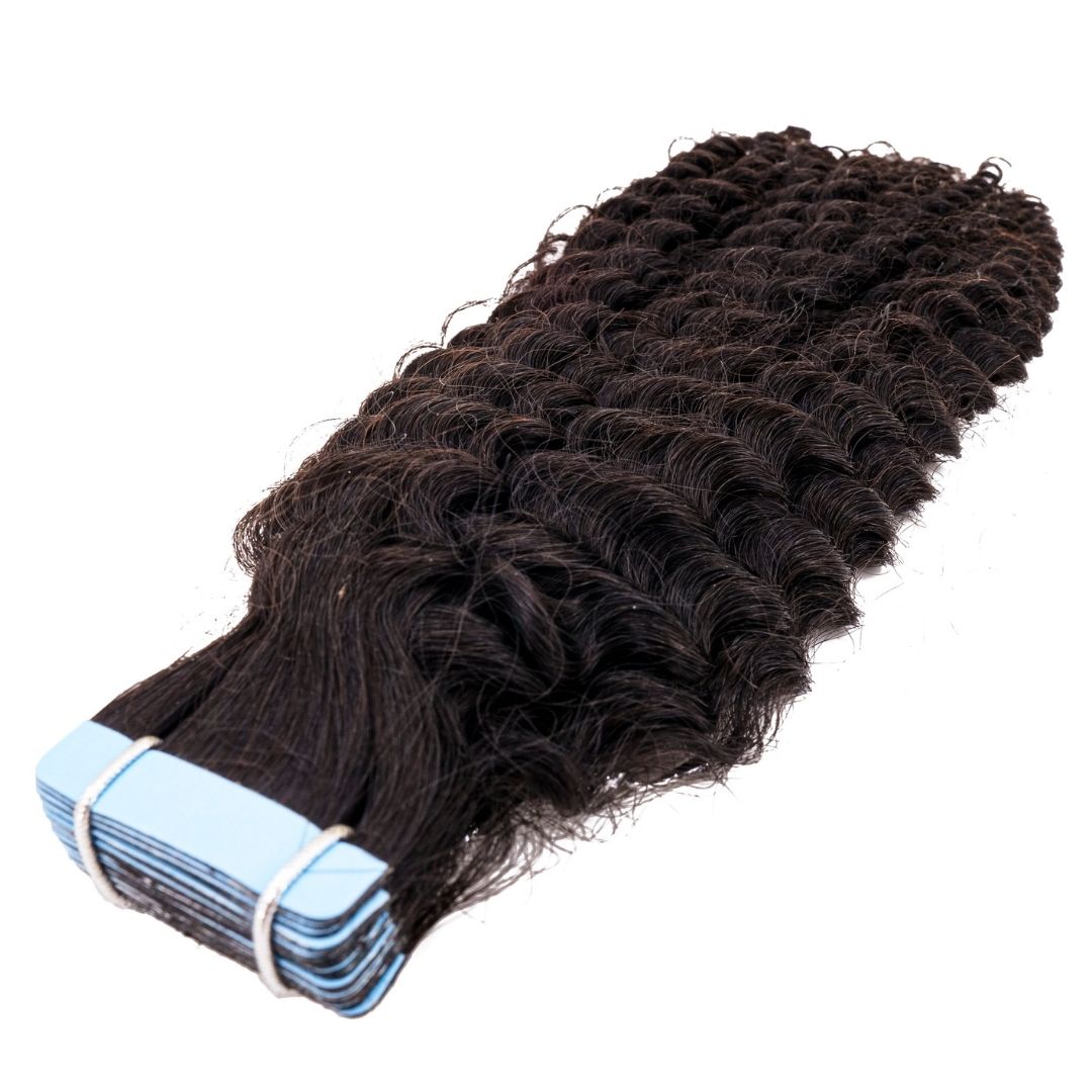 A set of Virgin Afro-Kinky Curly Tape-In Extensions .