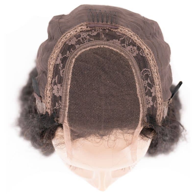 Presenting a top view of the hairdiamondz Kinky Straight Transparent Closure Wig, featuring transparent lace mesh at the front with intricate detailing around the edges. The cap showcases dark brown virgin hair with a curly texture seamlessly attached at the back and sides.